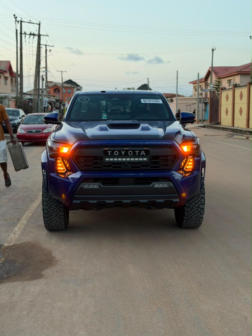 Front view of a blue Toyota Tundra pickup